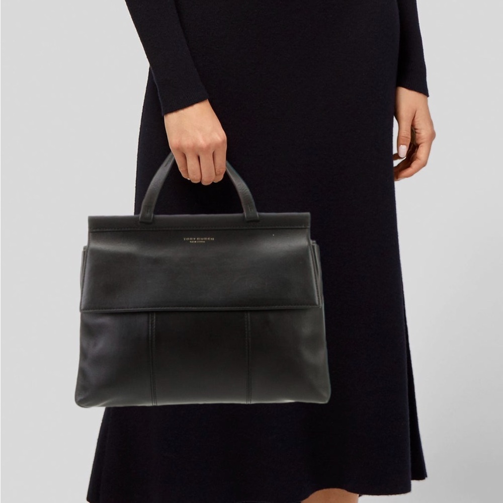 Tory Burch black leather top handle bag with shoulder strap. EUC